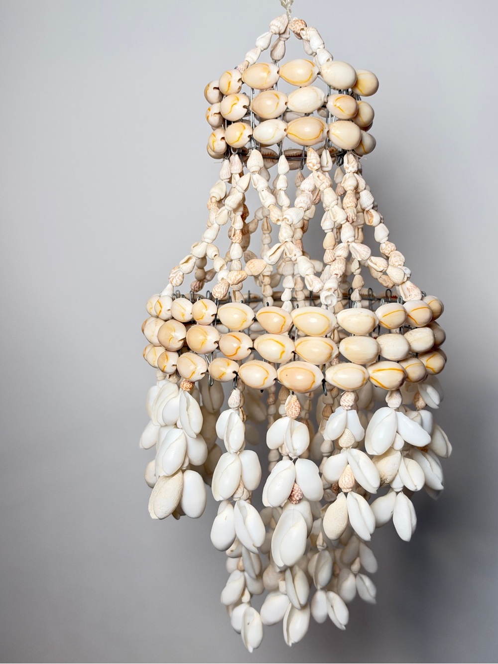 vintage cowrie and bubble shell tiered chandelier Anthropology bohemian nursery